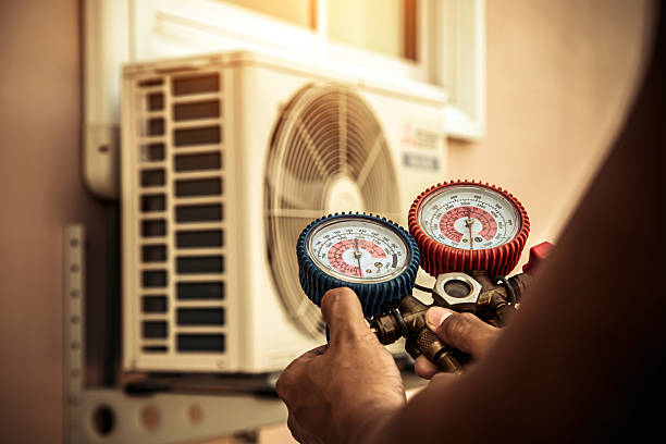 Professional Furnace Repair technician working in Street, MD
